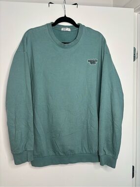 Relaxed Seafoam Green Crewneck Sweatshirt with Subtle Chest Logo